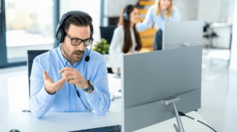 dedicated-male-customer-service-representative-600nw-2271552655